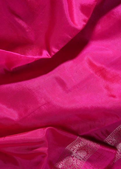 Radiant Rani Pink Banarasi Silk Saree with Intricate Silver Zari Buta Work
